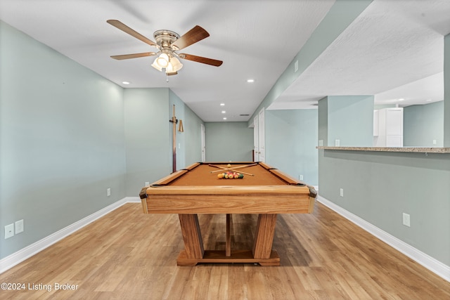 recreation room featuring billiards, light wood-type flooring, and ceiling fan