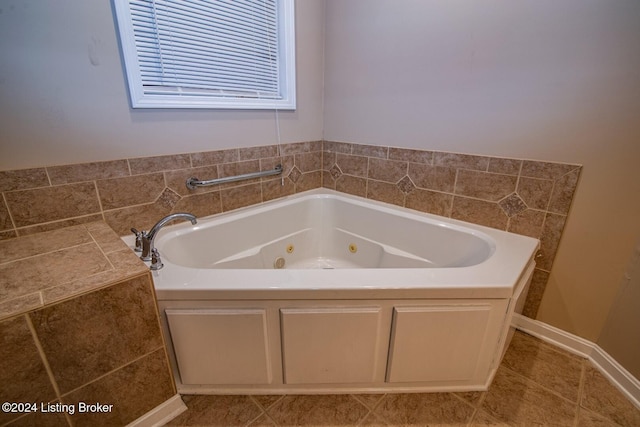 bathroom featuring a tub and tile patterned floors