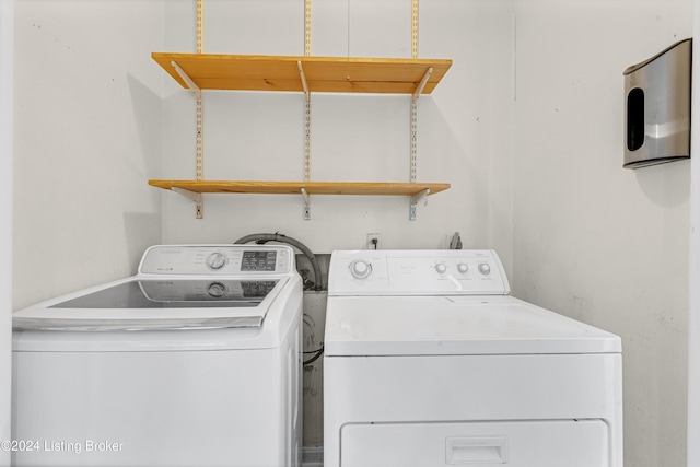 laundry area featuring independent washer and dryer