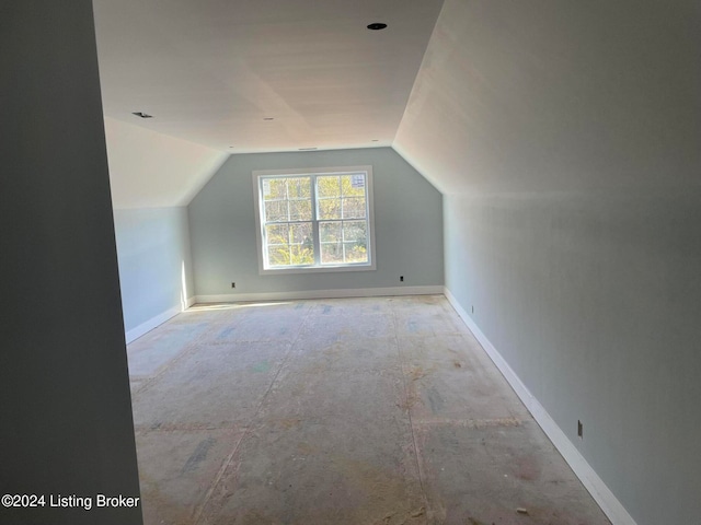 bonus room with vaulted ceiling