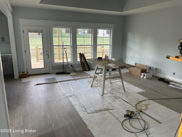 unfurnished dining area featuring light hardwood / wood-style floors and a healthy amount of sunlight