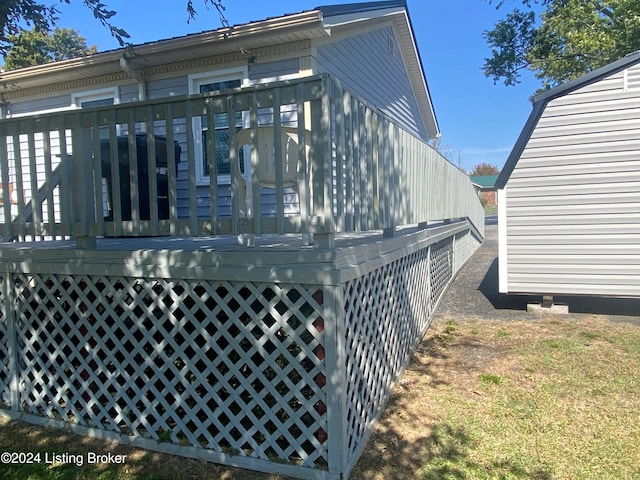 view of side of home with a deck