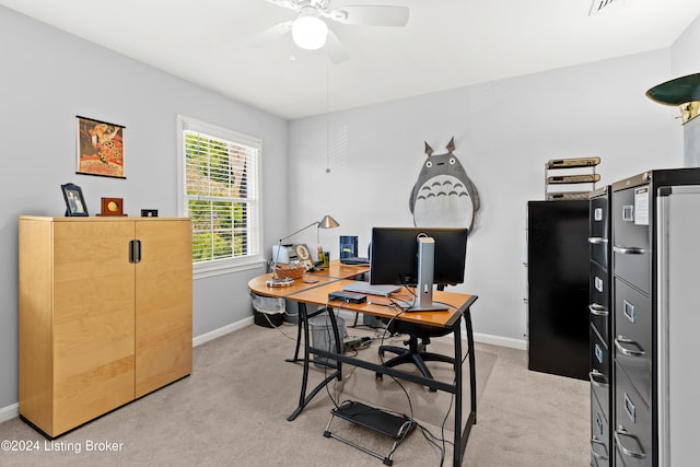 office space featuring light colored carpet and ceiling fan