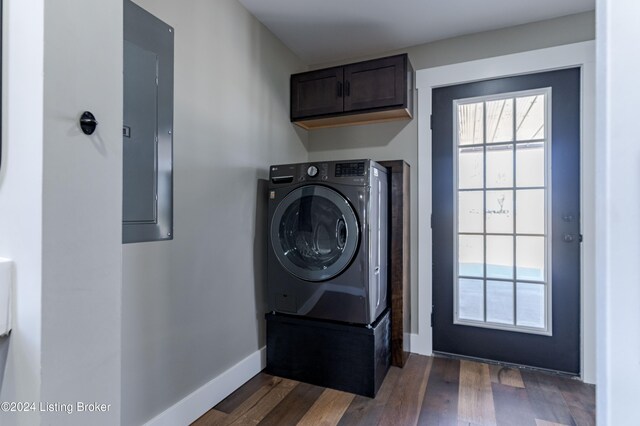 216 Millerstown St, Clarkson, KY 42726 - laundry area with cabinet space, washer / dryer, electric panel, dark wood-style flooring, and baseboards