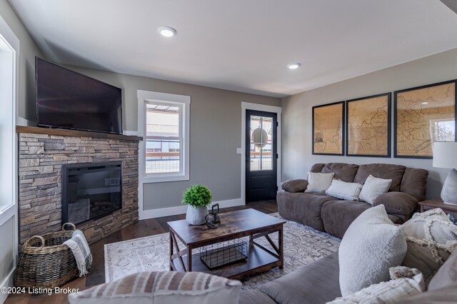 216 Millerstown St, Clarkson, KY 42726 - living room featuring wood finished floors, baseboards, a fireplace, and recessed lighting