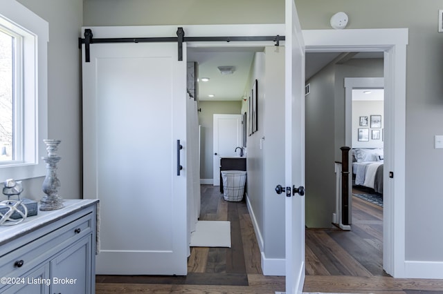 216 Millerstown St, Clarkson, KY 42726 - bathroom with ensuite bathroom, wood finished floors, healthy amount of natural light, and baseboards