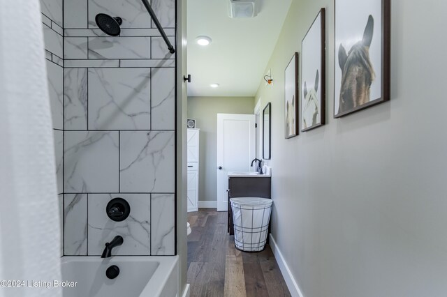 216 Millerstown St, Clarkson, KY 42726 - full bathroom featuring vanity, wood finished floors, tub / shower combination, and baseboards