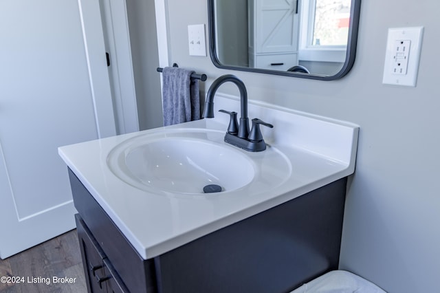 216 Millerstown St, Clarkson, KY 42726 - bathroom featuring vanity and wood finished floors