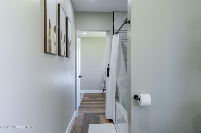 216 Millerstown St, Clarkson, KY 42726 - hallway featuring wood finished floors and baseboards