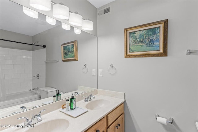 full bathroom with washtub / shower combination, vanity, and toilet