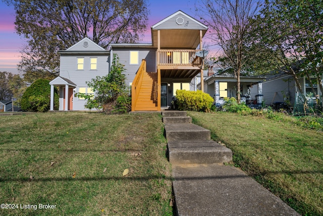 view of front of house with a lawn