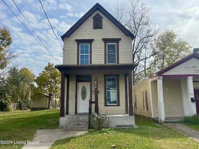 front facade with a front yard