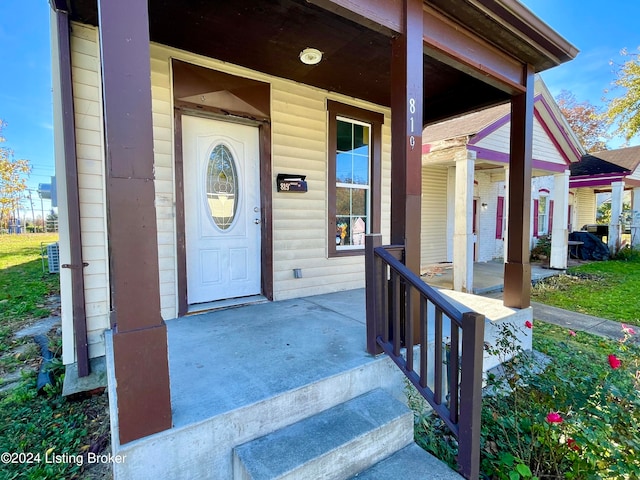 entrance to property with covered porch