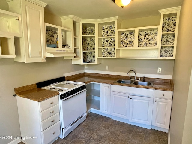 kitchen with sink, electric range, and white cabinets