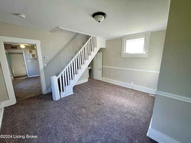 interior space with dark carpet