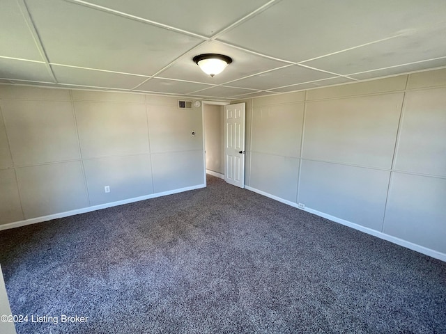 empty room with carpet flooring