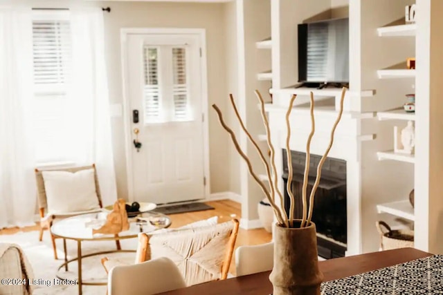 interior space featuring hardwood / wood-style floors and plenty of natural light