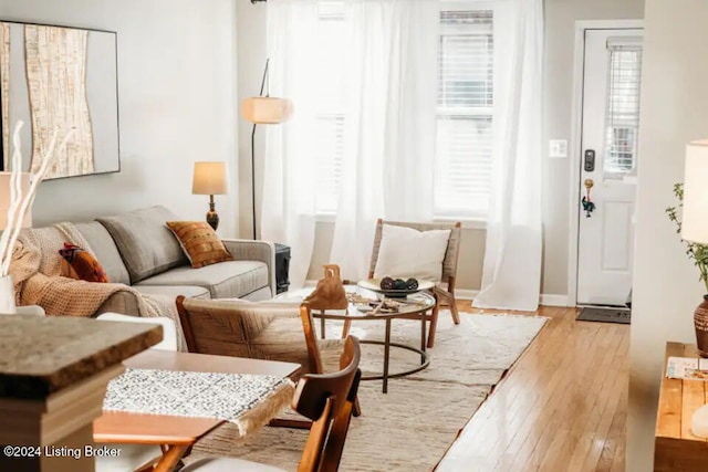 sitting room with light hardwood / wood-style floors