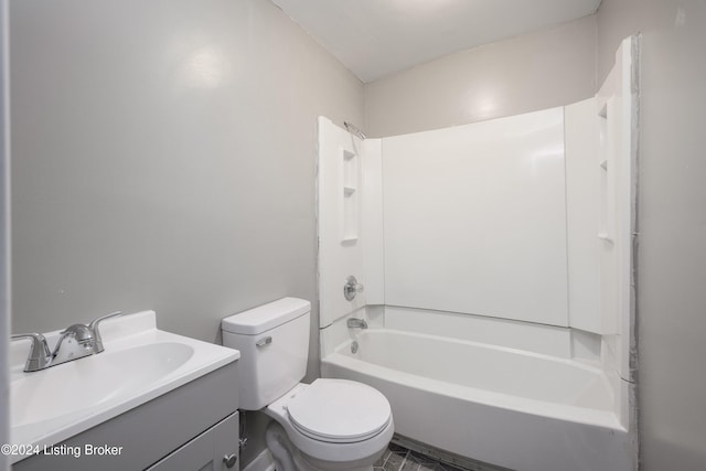 full bathroom with shower / washtub combination, vanity, and toilet