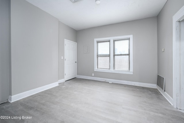 unfurnished room featuring light wood-type flooring