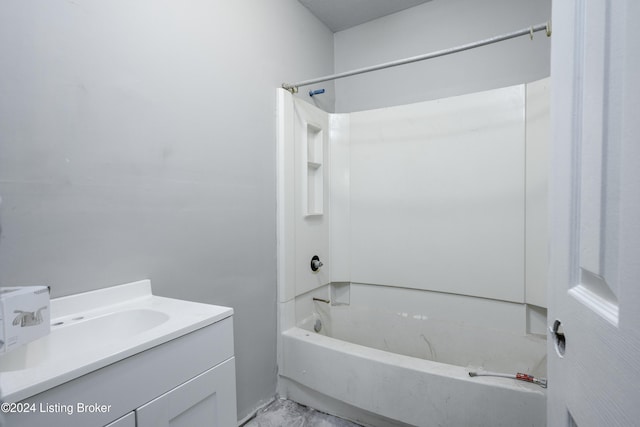 bathroom with tub / shower combination and vanity