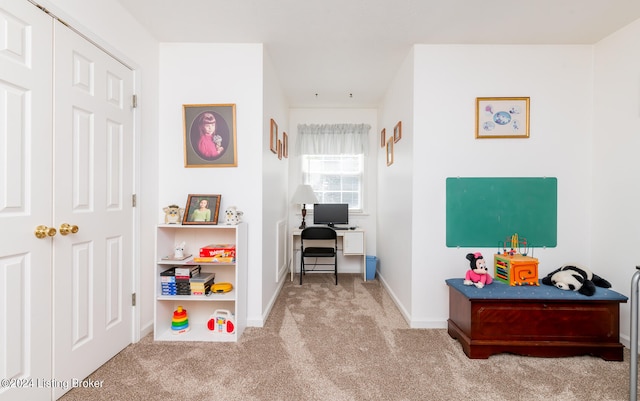 playroom featuring carpet flooring