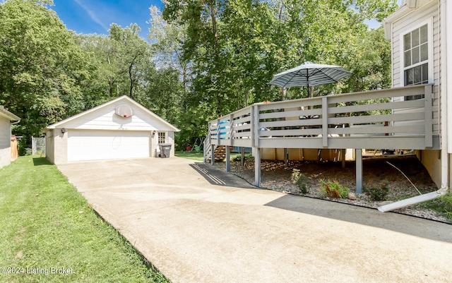 exterior space featuring an outbuilding and a garage