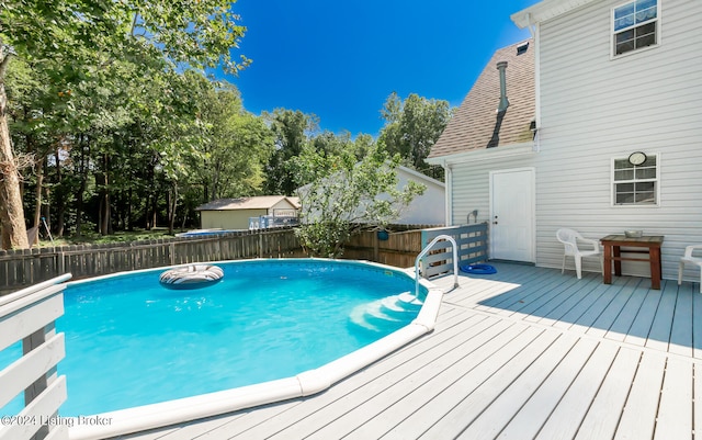 view of pool featuring a wooden deck