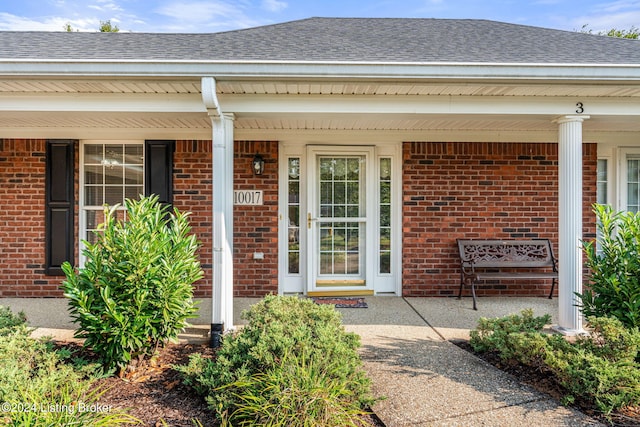 entrance to property with a porch