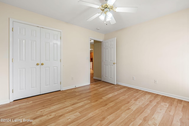 unfurnished bedroom featuring a closet, ceiling fan, and light hardwood / wood-style floors