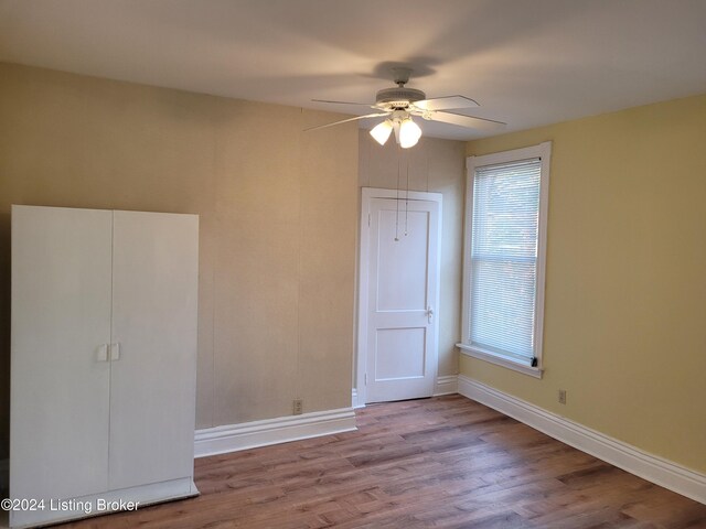 spare room featuring ceiling fan and light hardwood / wood-style flooring