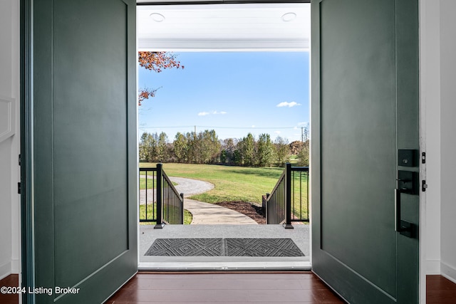 entryway with dark wood-type flooring