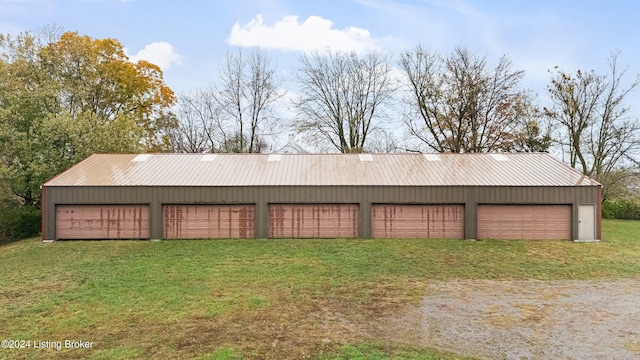 garage with a yard