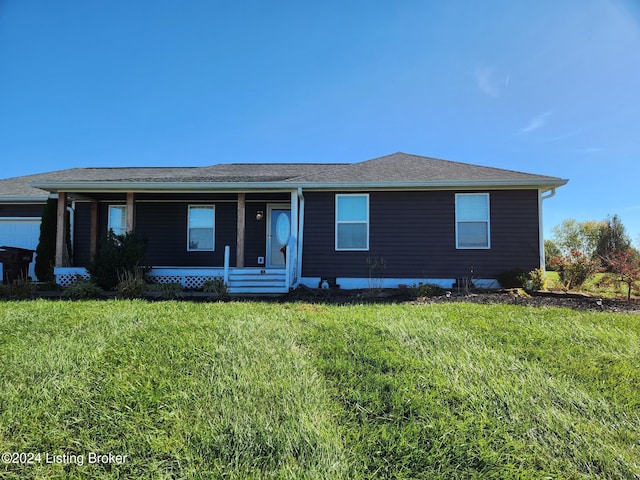 single story home featuring a front lawn and a porch