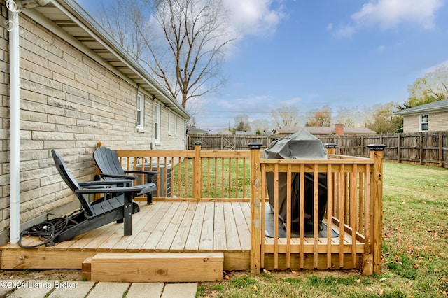 deck featuring a lawn