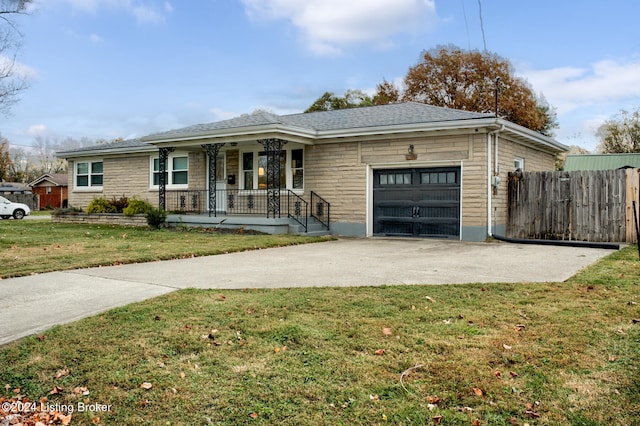 ranch-style home with a garage, a porch, and a front yard