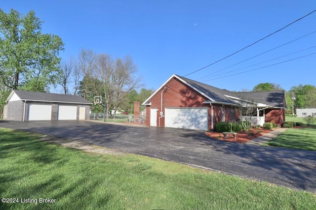 view of side of home featuring a yard