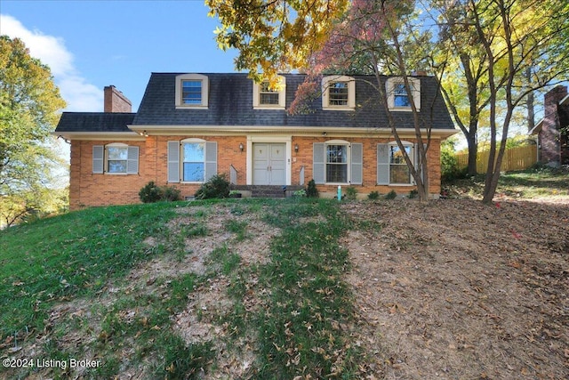 view of new england style home