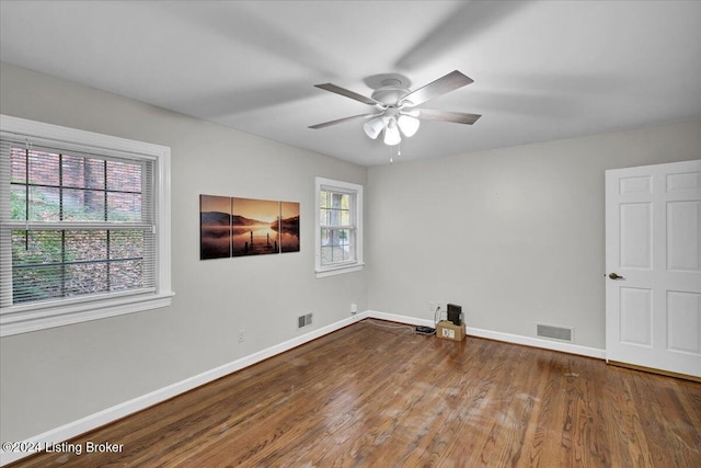 unfurnished room featuring hardwood / wood-style floors and ceiling fan