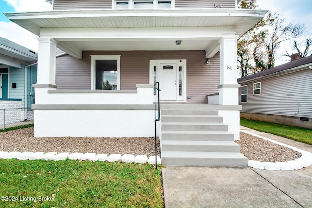 view of front of property featuring covered porch