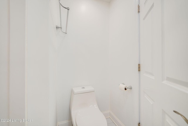 bathroom featuring toilet