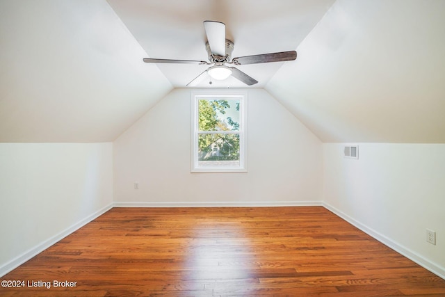 bonus room with vaulted ceiling, hardwood / wood-style floors, and ceiling fan