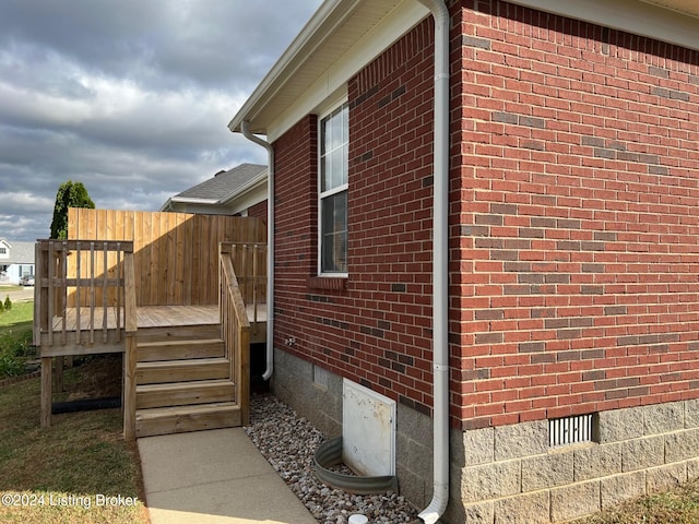 view of property exterior featuring a deck