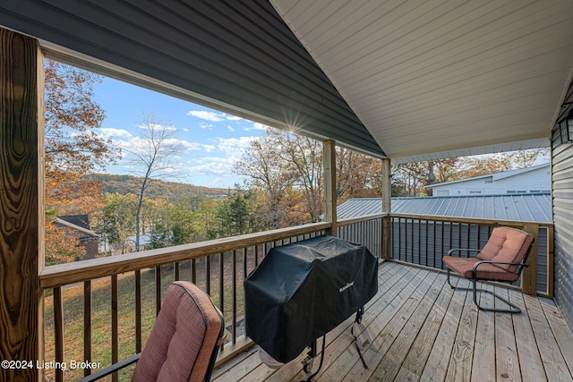 wooden deck featuring grilling area