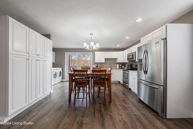 dining space featuring washer and dryer, a textured ceiling, an inviting chandelier, and dark hardwood / wood-style flooring