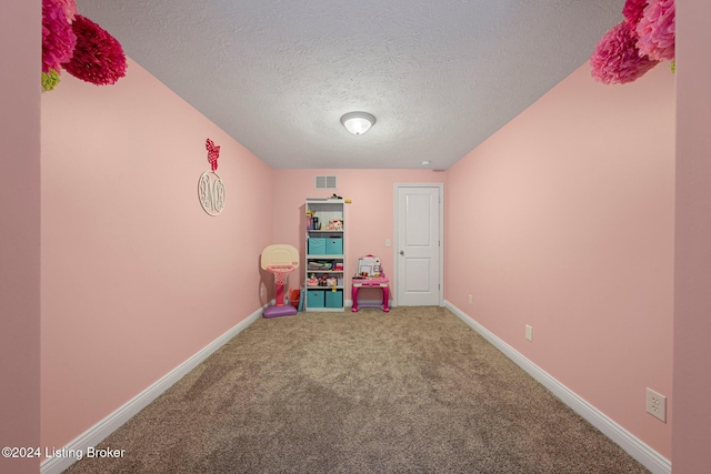 22 Harmony Ln, Clarkson, KY 42726 - playroom with a textured ceiling and carpet floors