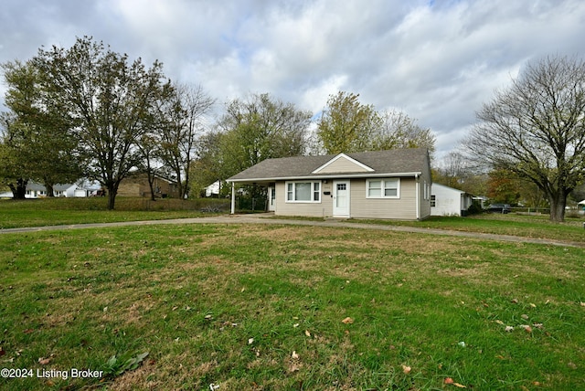 ranch-style house with a front yard