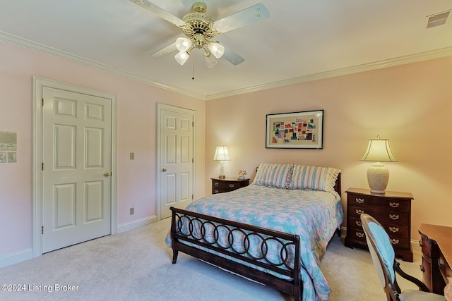 bedroom featuring ceiling fan, light carpet, and crown molding