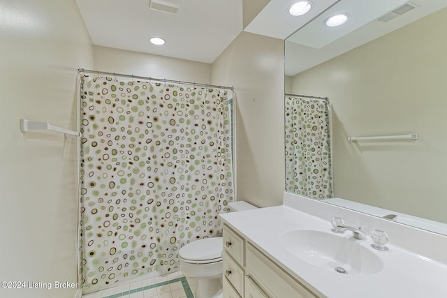 bathroom featuring vanity, tile patterned floors, toilet, and a shower with curtain