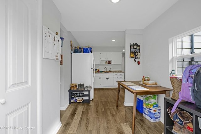 interior space with dark hardwood / wood-style floors and sink